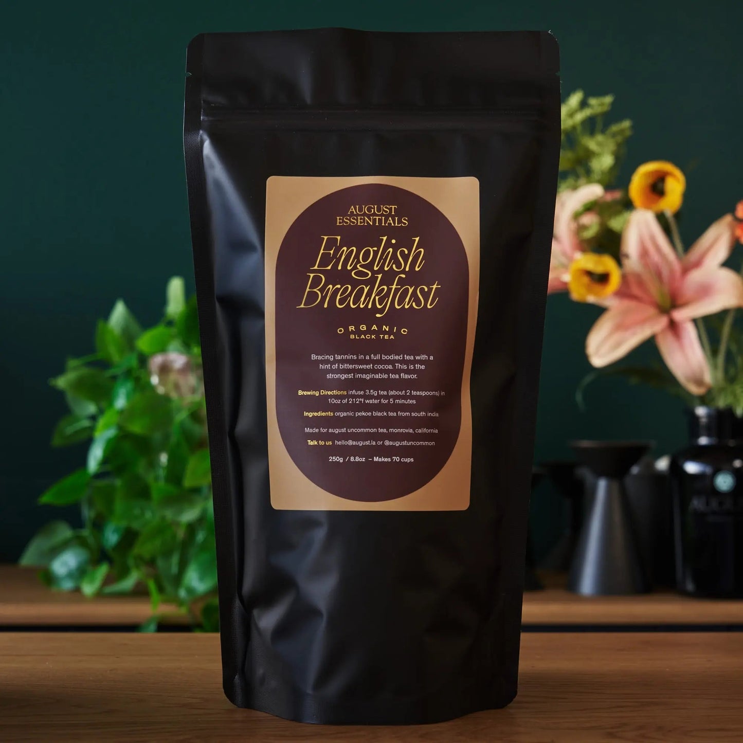 August Essentials English Breakfast black tea pouch, organic black tea, dark front bag