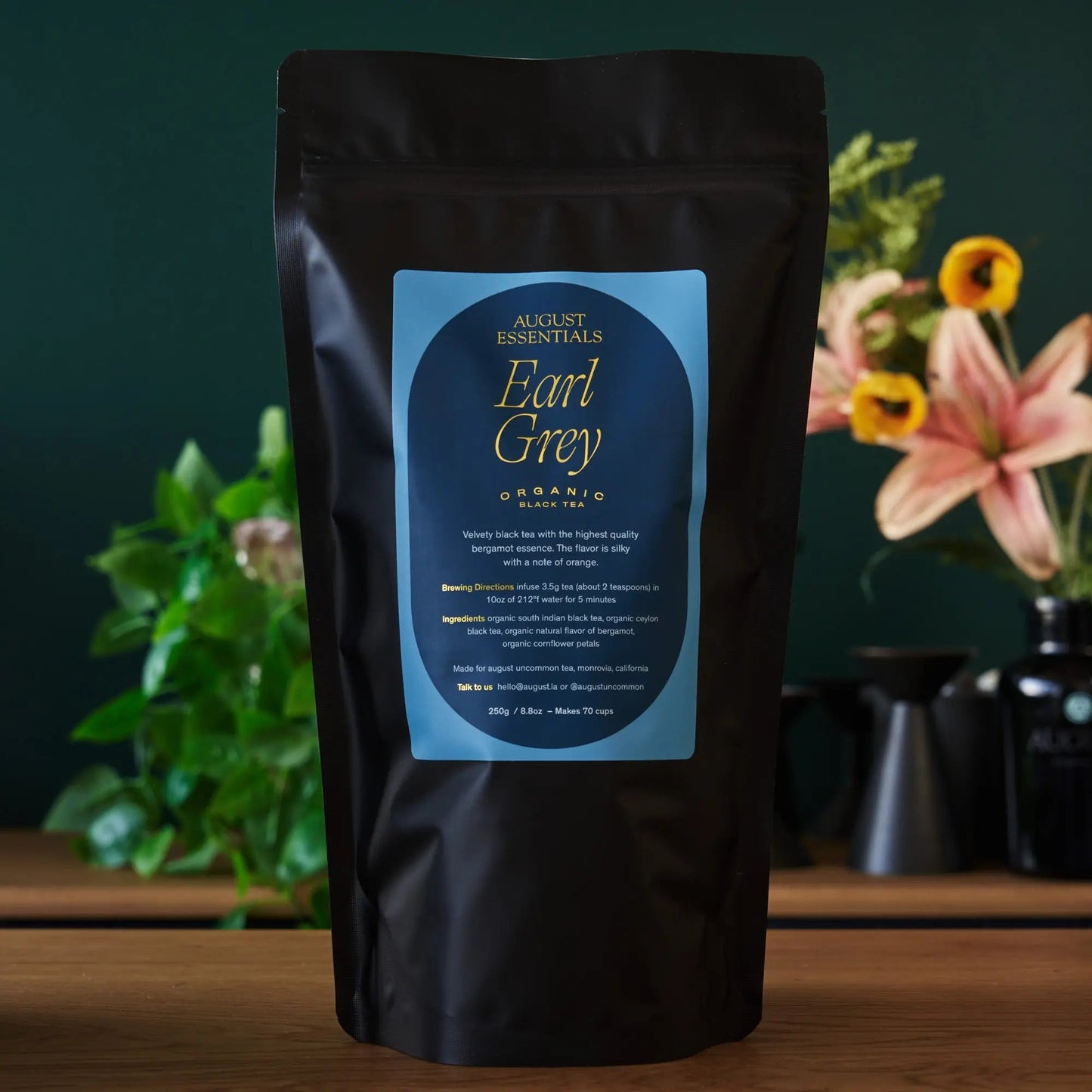 Black tea pouch with blue label, standing upright