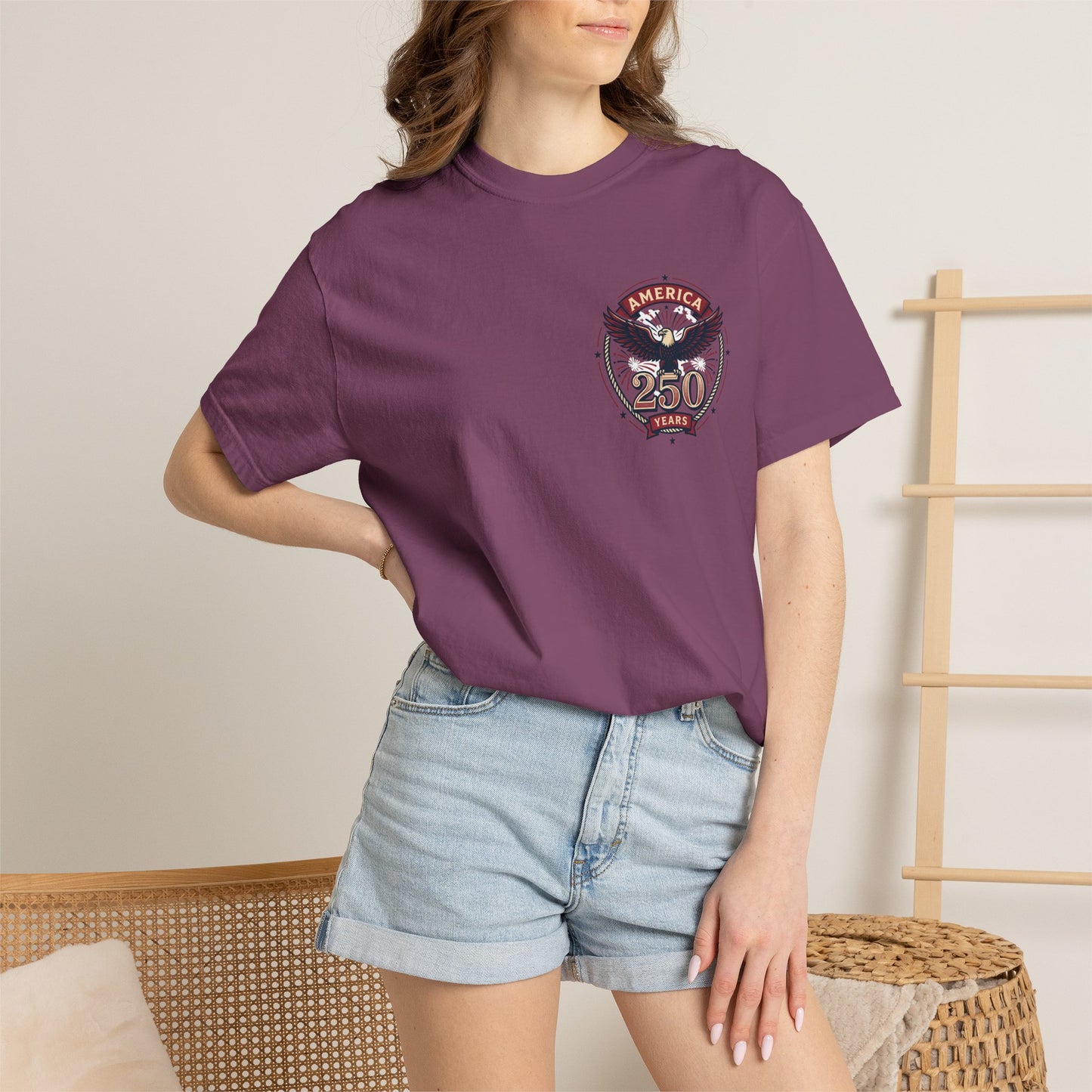 Plum T-shirt with America 250 circular eagle logo on chest, short sleeves