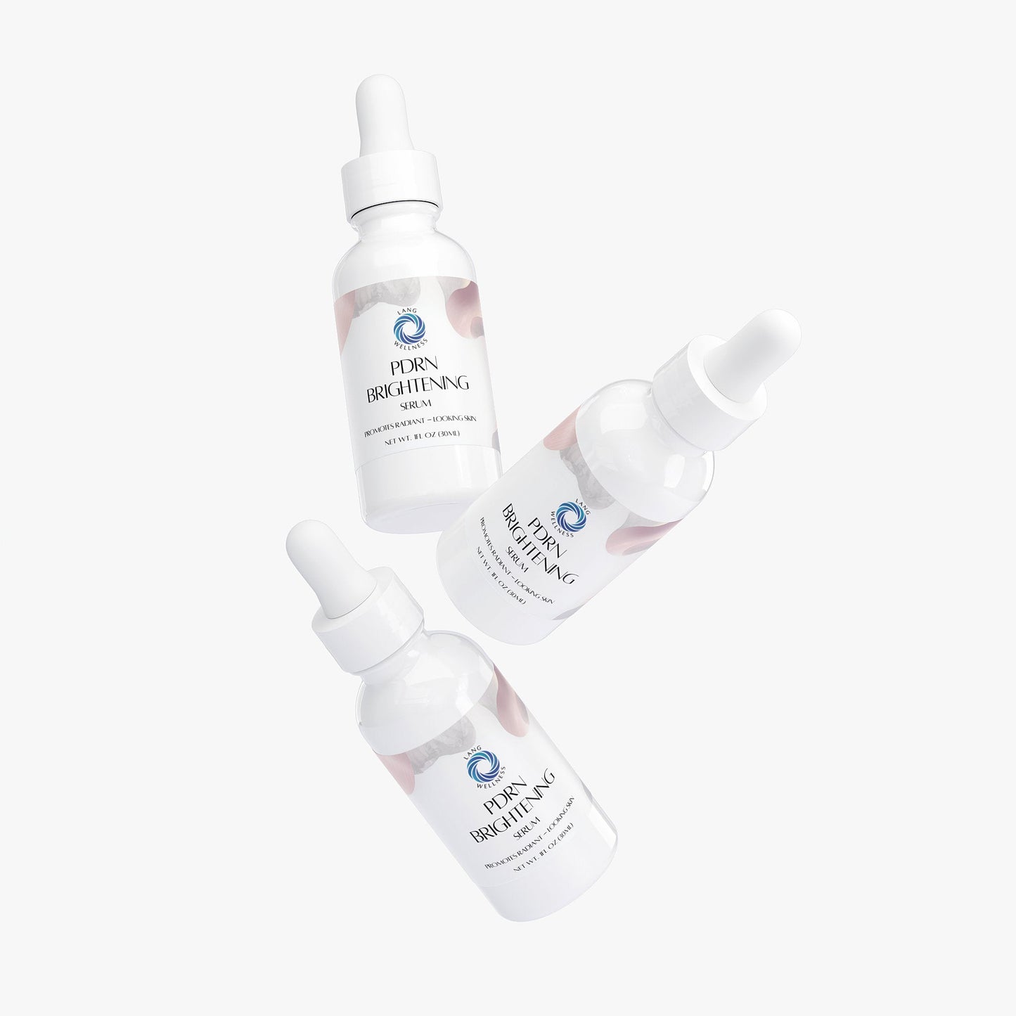 PDRN brightening serum set of bottles with droppers arranged diagonally