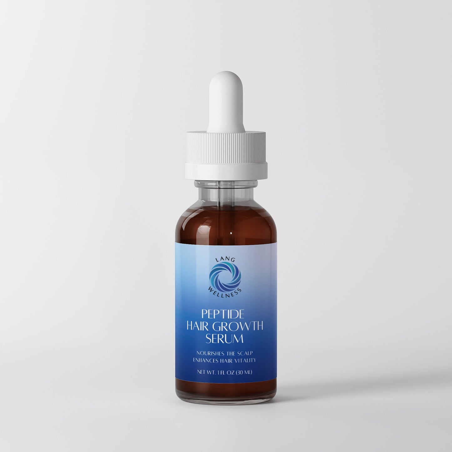 Hair growth serum bottle with white dropper cap, amber glass and blue label