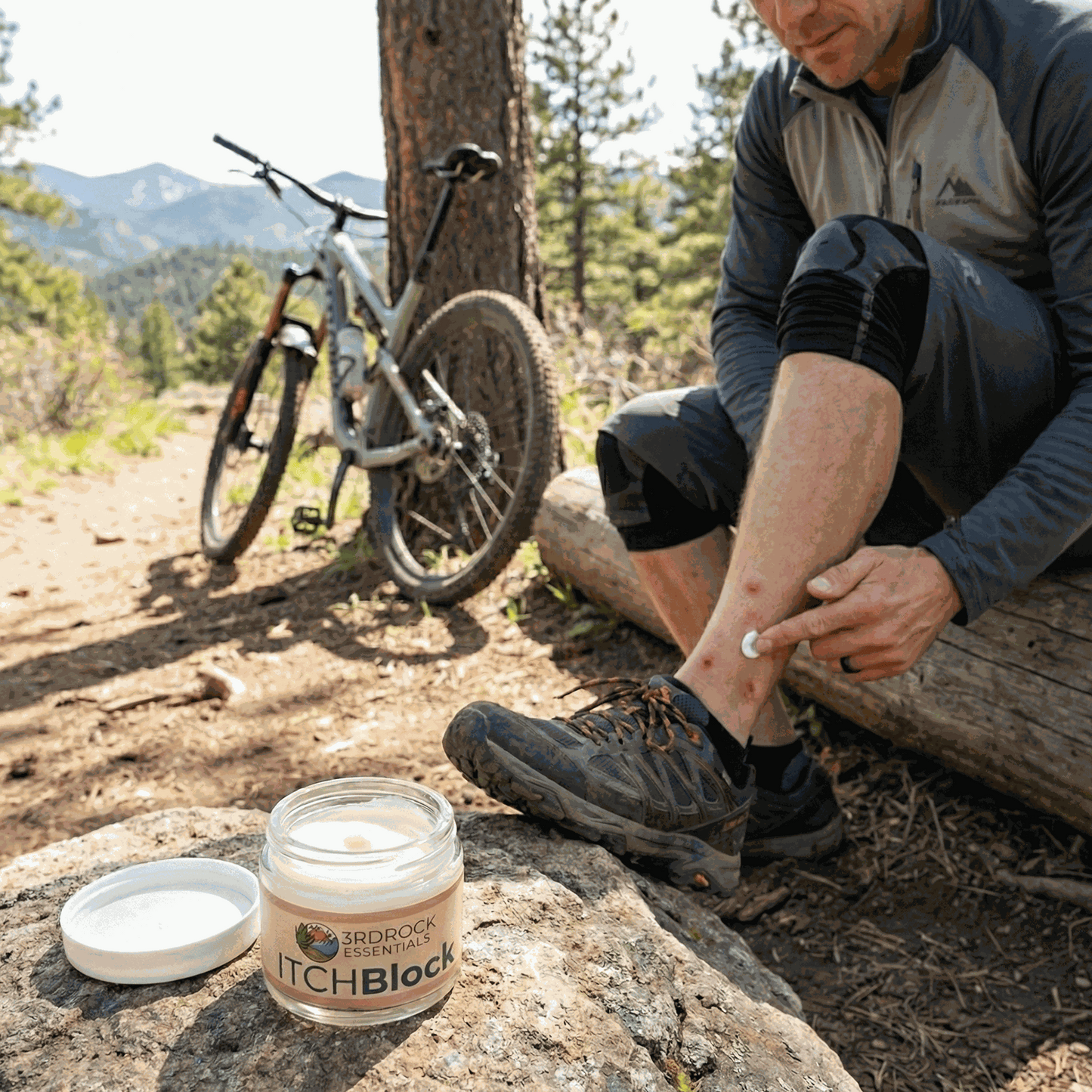 Itch relief cream jar with open lid beside man's knee, ready to apply