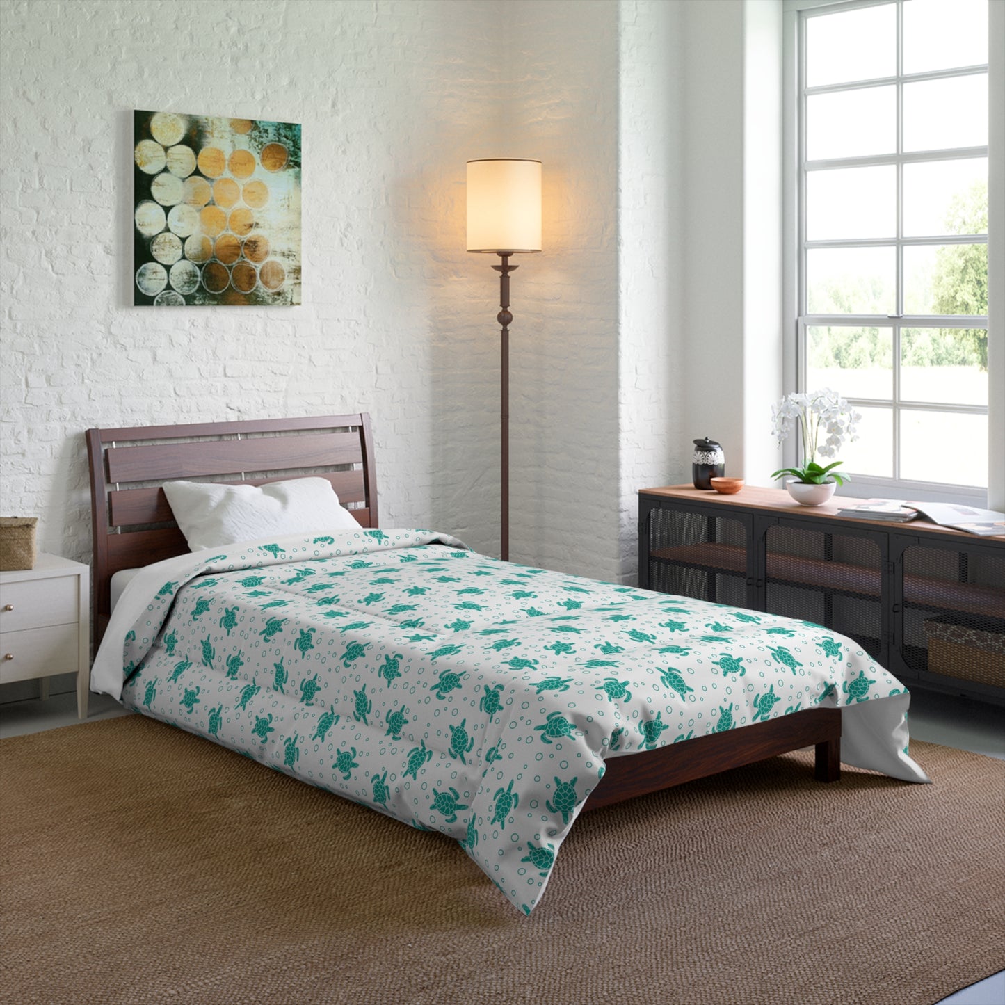 Comforter with teal all-over floral print on white, centered on bed surface