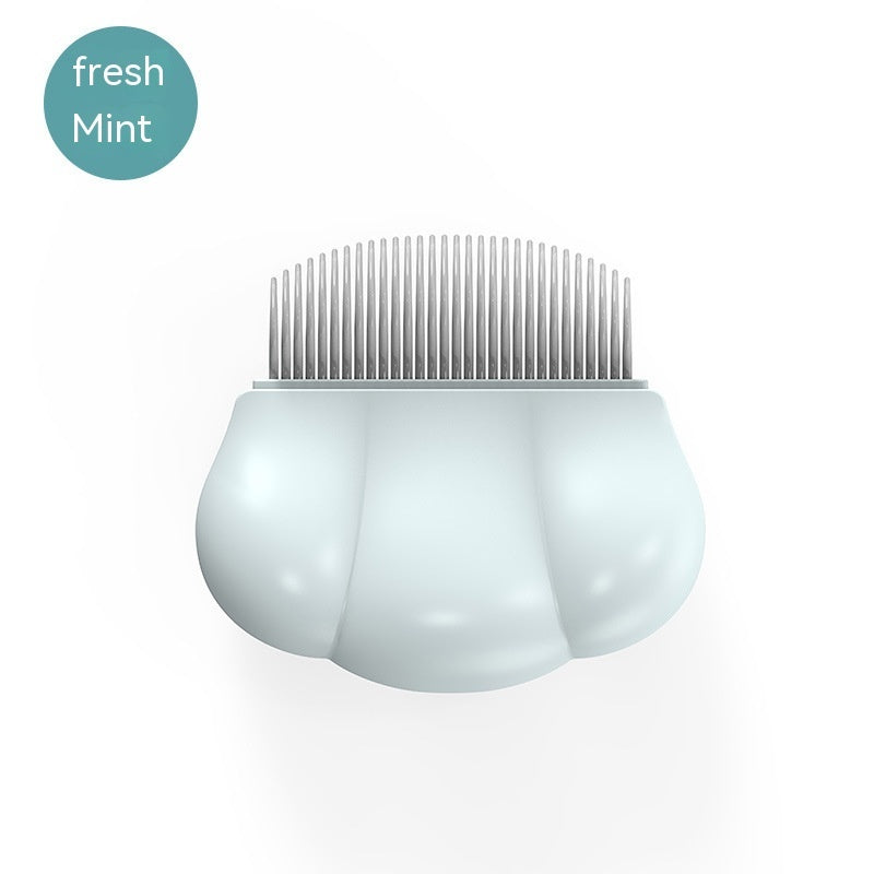 Pet grooming comb with fine metal teeth, mint-colored plastic base