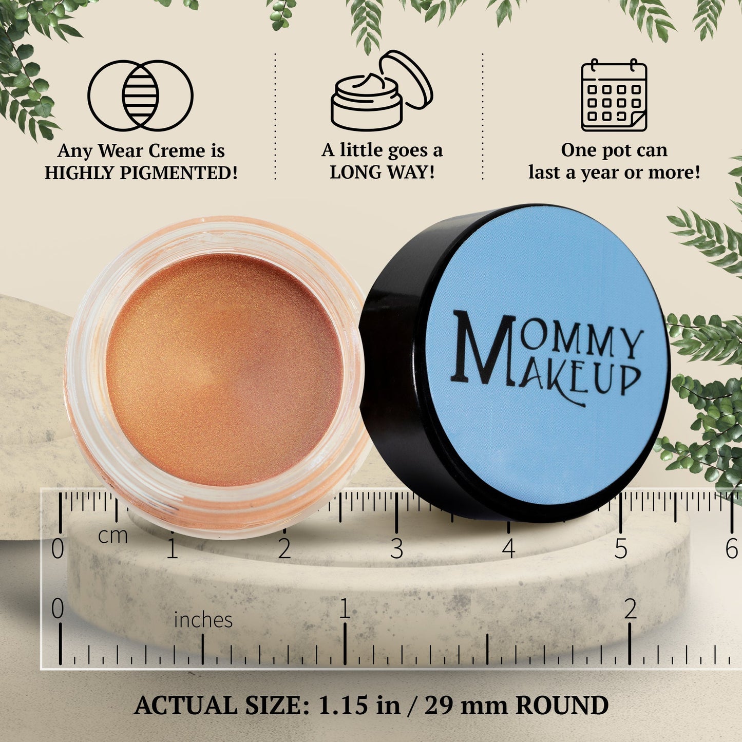 Golden apricot shimmer cream jar with round lid next to a ruler.