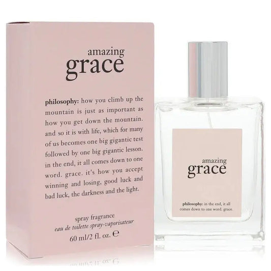 Women's perfume bottle with pink label and clear glass, shown with pink carton