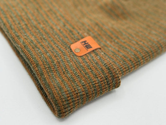 Cuffed knit beanie cuff with textured weave and orange logo label