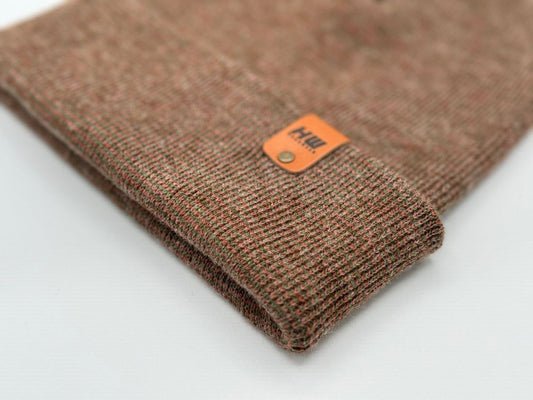 Cuffed knit beanie folded edge in dark brown knit with orange label