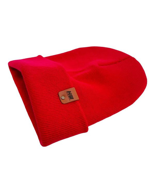 Scarlet red knit beanie angled view with ribbed cuff and square patch label