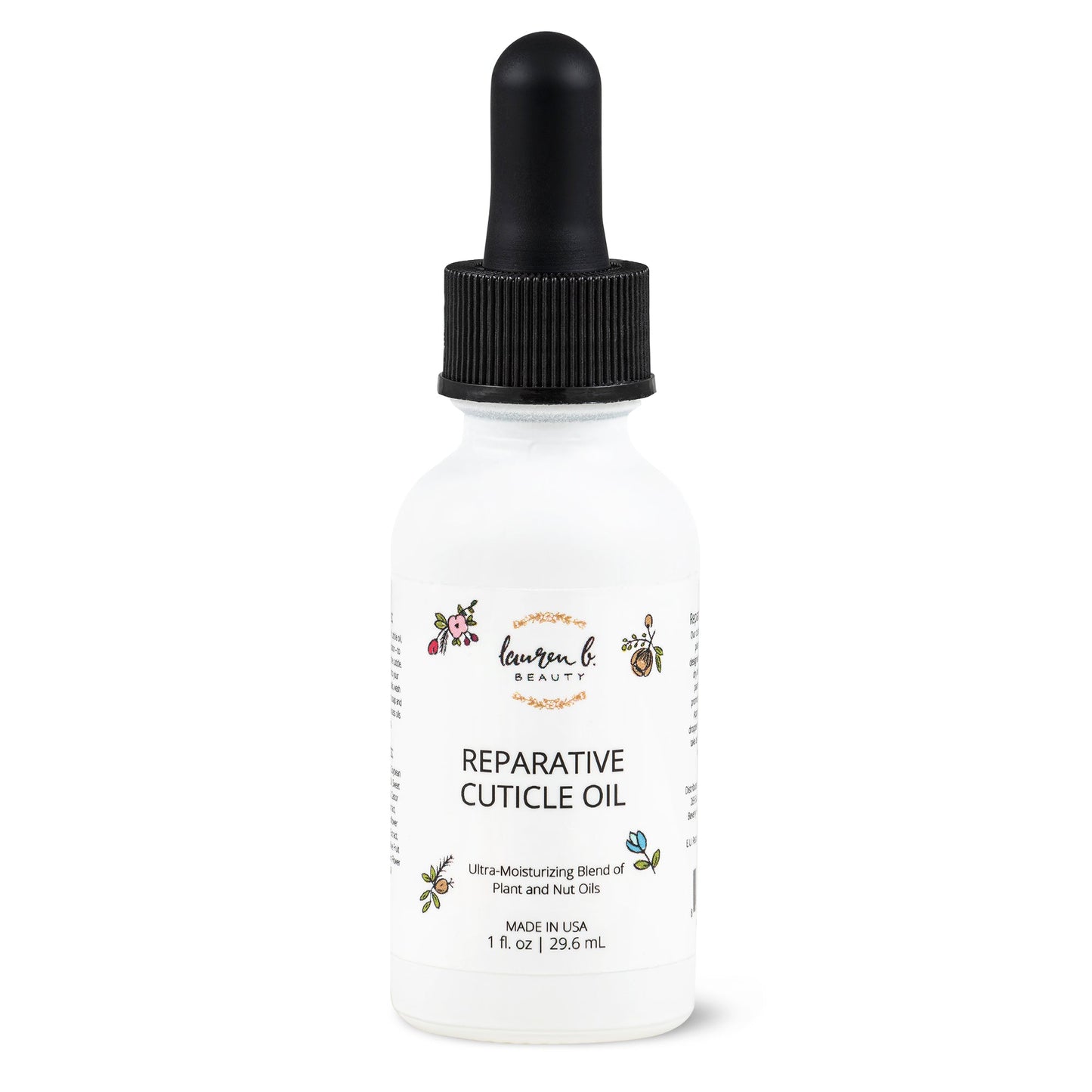 Cuticle oil bottle with black dropper, white label reading reparative cuticle oil