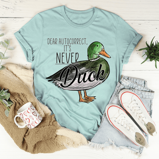 Dusty blue T-shirt with duck graphic and 'Dear Autocorrect, It's Never'