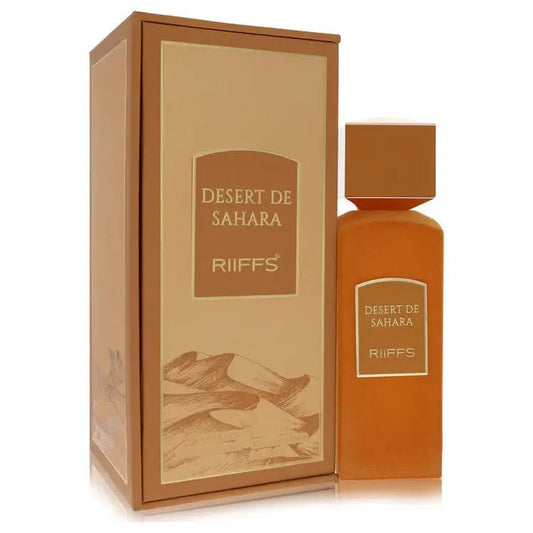 Unisex perfume bottle in amber-orange with square cap, shown with printed cardboard box
