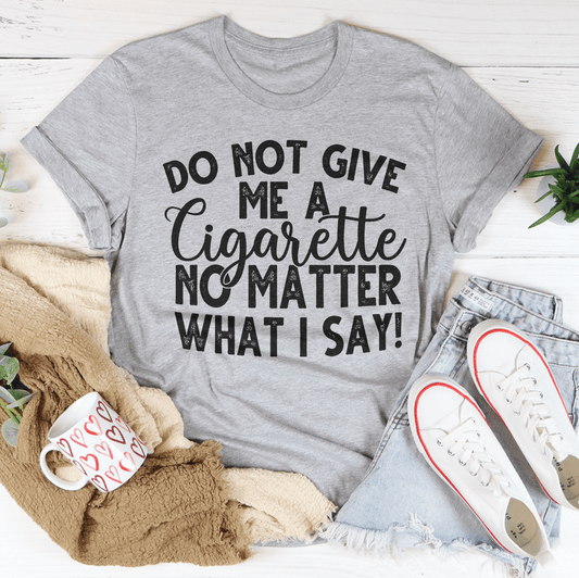 Gray short-sleeve crewneck T-shirt with bold slogan graphic text on front.