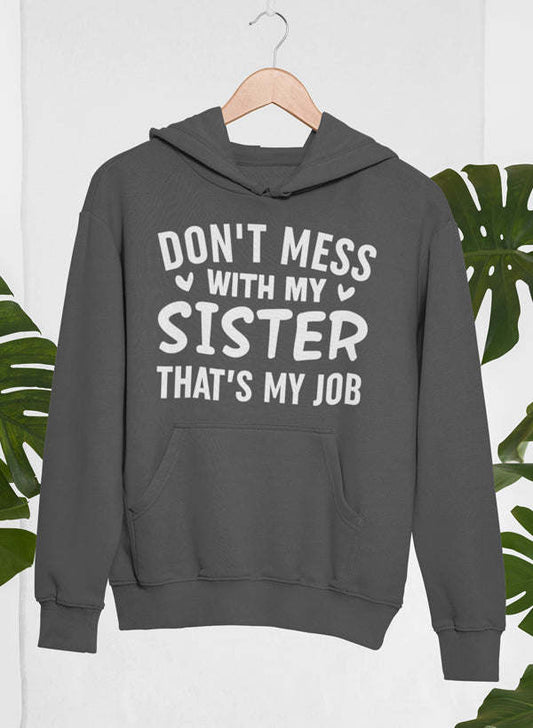 Dark heather pullover hoodie featuring 'DON'T MESS WITH MY SISTER THAT'S MY JOB' text