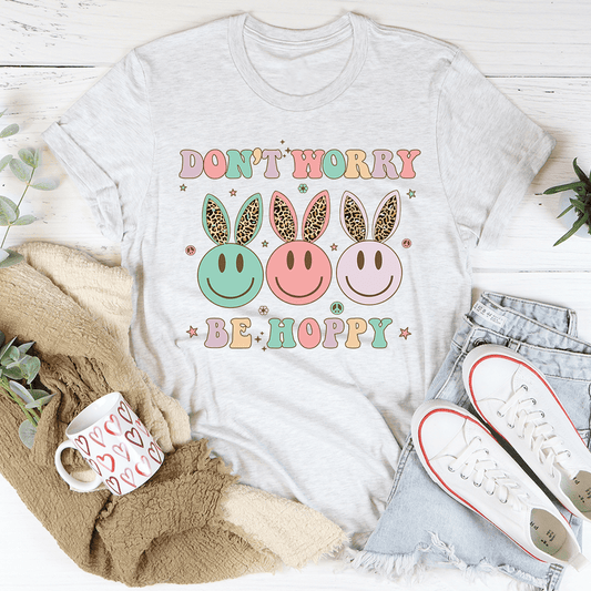 Light heather gray T-shirt with centered 'DON'T WORRY' 'BE HOPPY' design