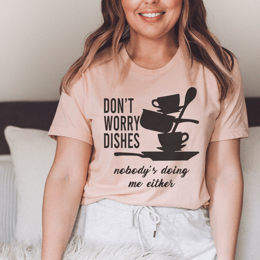 Peach crew-neck T-shirt with black 'DON’T WORRY DISHES' graphic