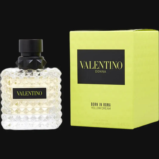 Green-yellow perfume box and bottle with Valentino Donna label, black pump cap