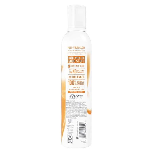 Shower foam bottle back label with white body, orange accents, and barcode area.