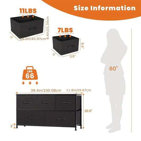 Black fabric drawer dresser with five front drawers and arched handles on legs