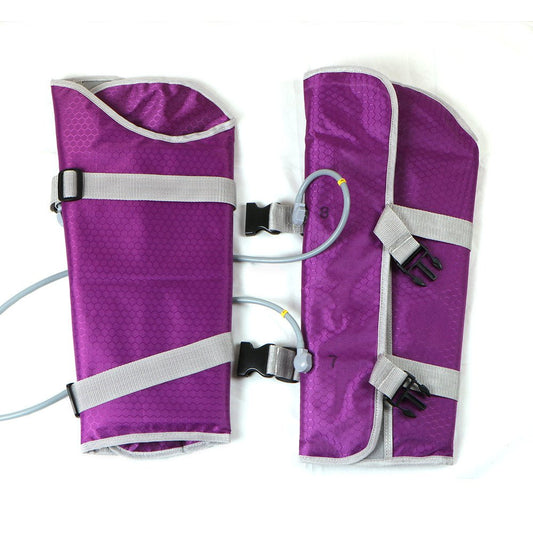 Pair of purple leg cuffs with white straps and connected hose fittings