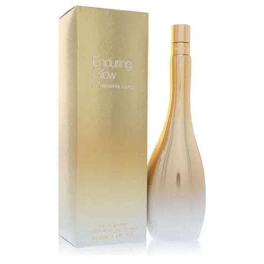 Women's perfume bottle and tall box, gold cap, clear glass with golden tint