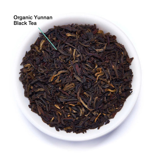 Bowl of organic black tea leaves