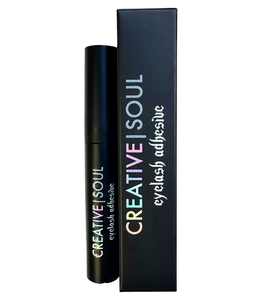 Black eyelash adhesive tube beside rectangular box, Creative Soul label