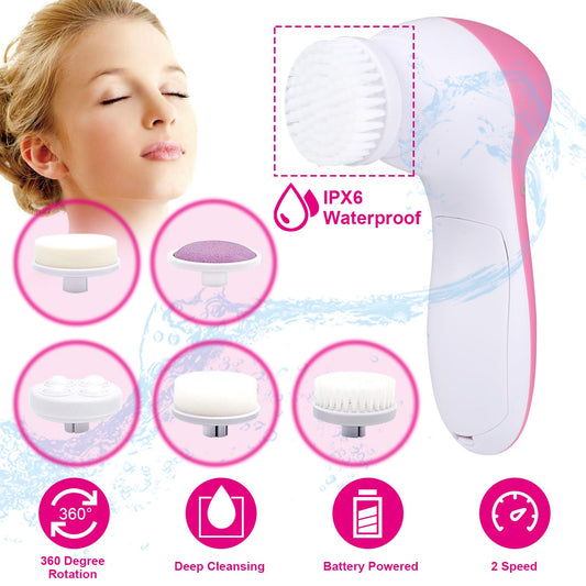 Pink and white facial cleansing brush with textured round brush head close-up