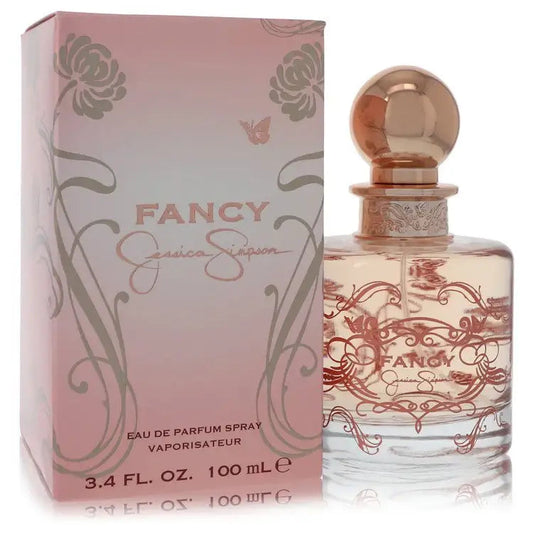 Eau de parfum spray bottle with rose-pink cap and floral script label, with matching box.