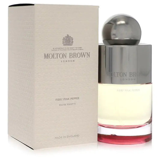 Molton Brown Fiery Pink Pepper eau de toilette bottle beside beige gift box
