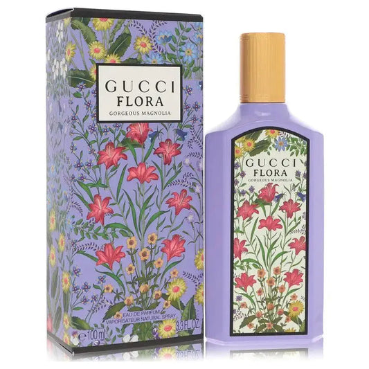 Gucci Flora Gorgeous Magnolia perfume box and bottle with floral design and gold cap