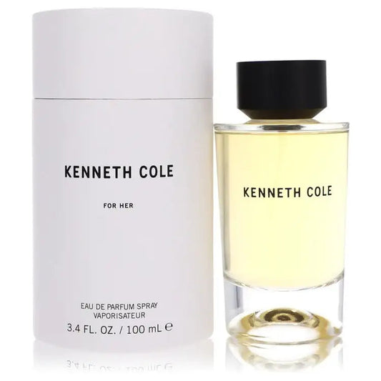 Women's eau de parfum spray bottle with black cap and golden liquid, with box