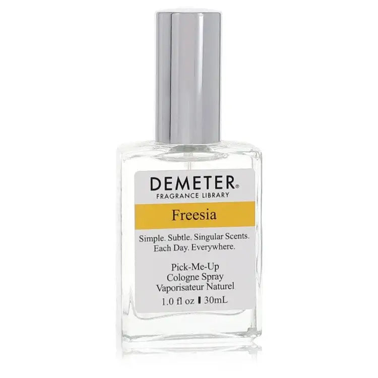 Freesia perfume spray bottle with Demeter label and silver cap