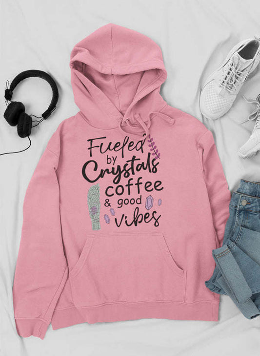 Mauve hoodie with drawstring hood, kangaroo pocket, “Fueled by Crystals” print.