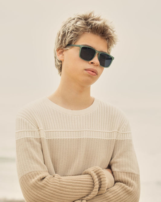 GLACIER polarized sunglasses on model, green frame with dark lenses