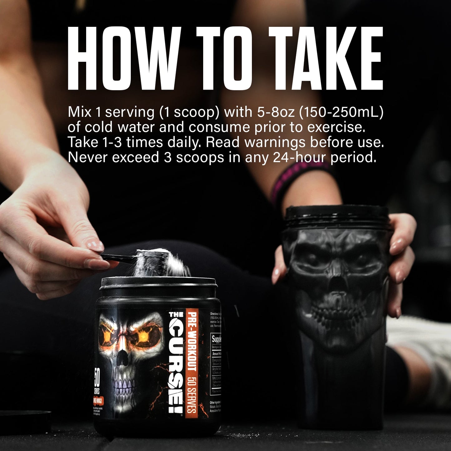 Pre-workout supplement jar with skull label, hands holding jar and scoop