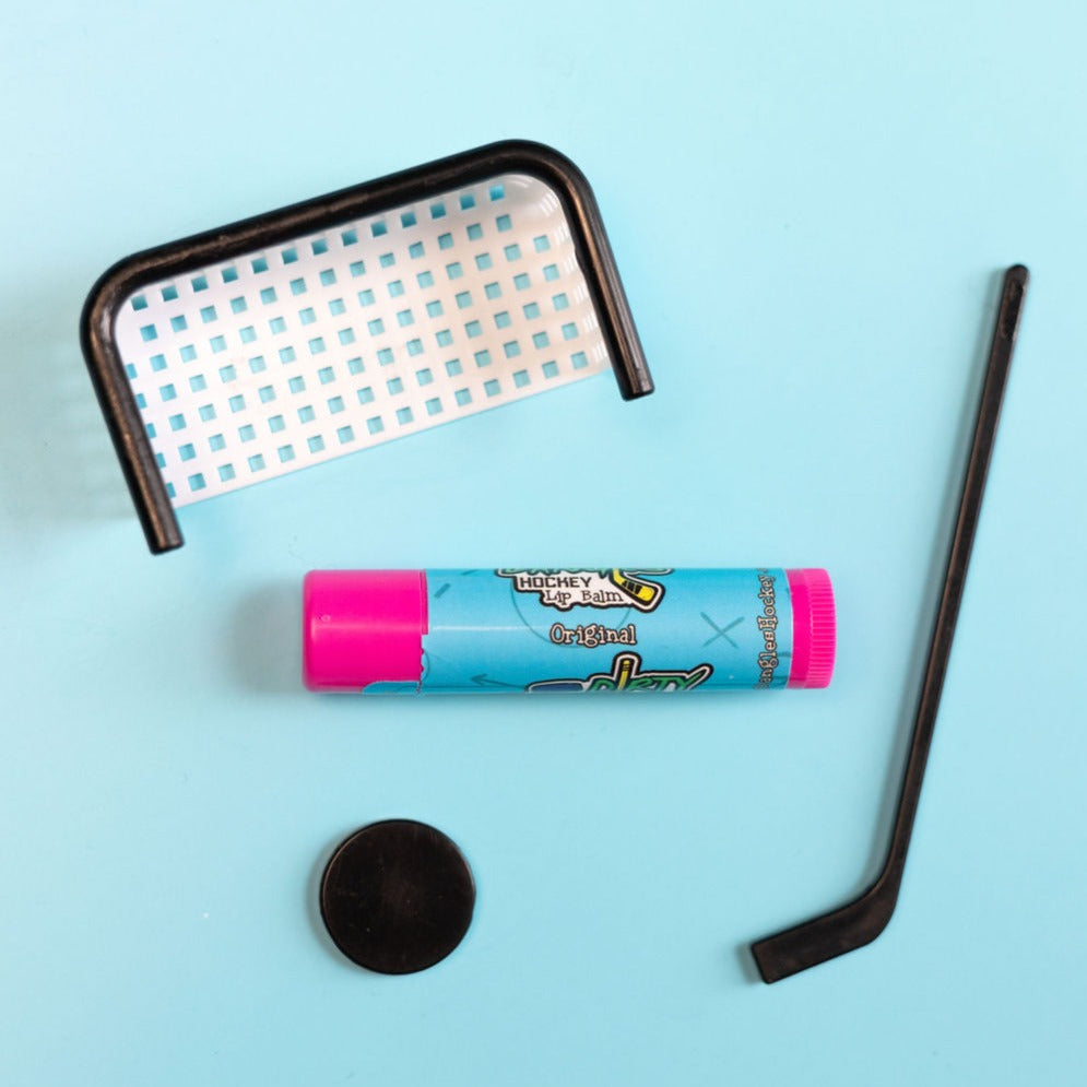 Original lip balm tube with pink cap and blue body