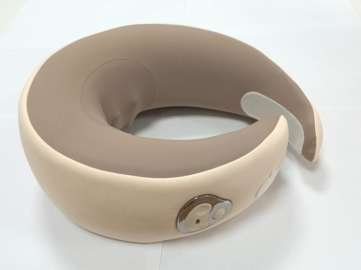 Beige U-shaped neck massage pillow with front control panel and curved support ring