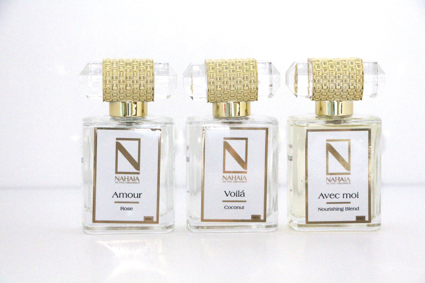 Natural Perfume Gift Set 3 × 1.76 fl oz Eau de Parfum A luxury trio of organic essential oil perfumes: Nourishing Blend, Rose, and Coconut. Natural, non-synthetic, sensual, and uplifting.