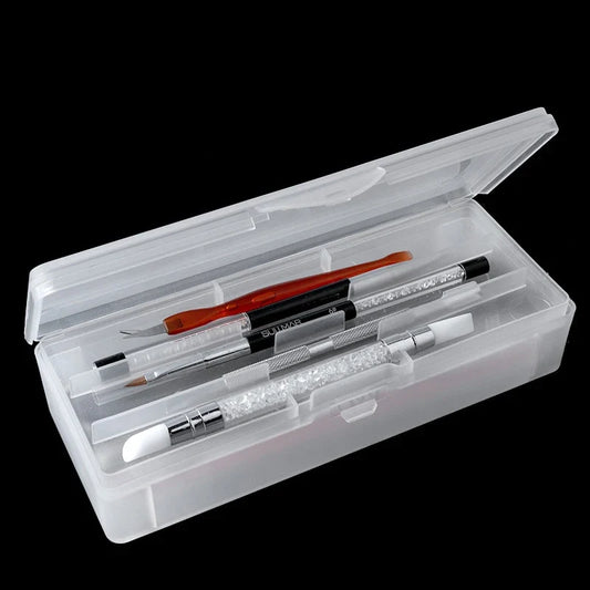Double-layer clear plastic nail tool storage box with pens, clippers, and buffers inside