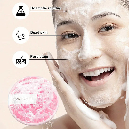 Pink round cosmetic sponge pad on cheek, showing makeup removal foam effect