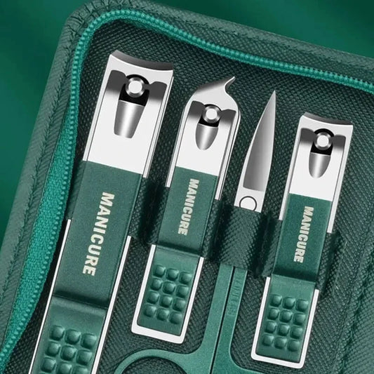 Green nail clipper and nail file tools in a zippered nail kit case, close-up