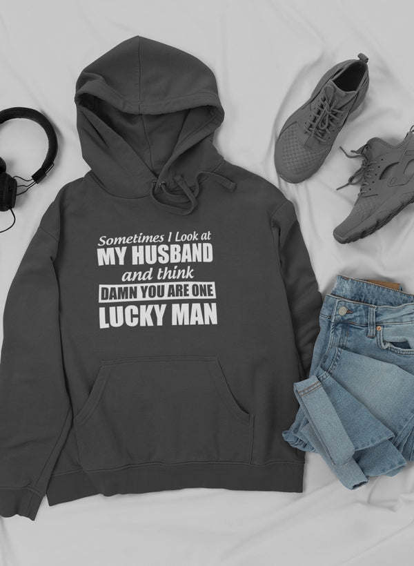Dark charcoal pullover hoodie with drawstring hood, front pouch pocket, and printed text