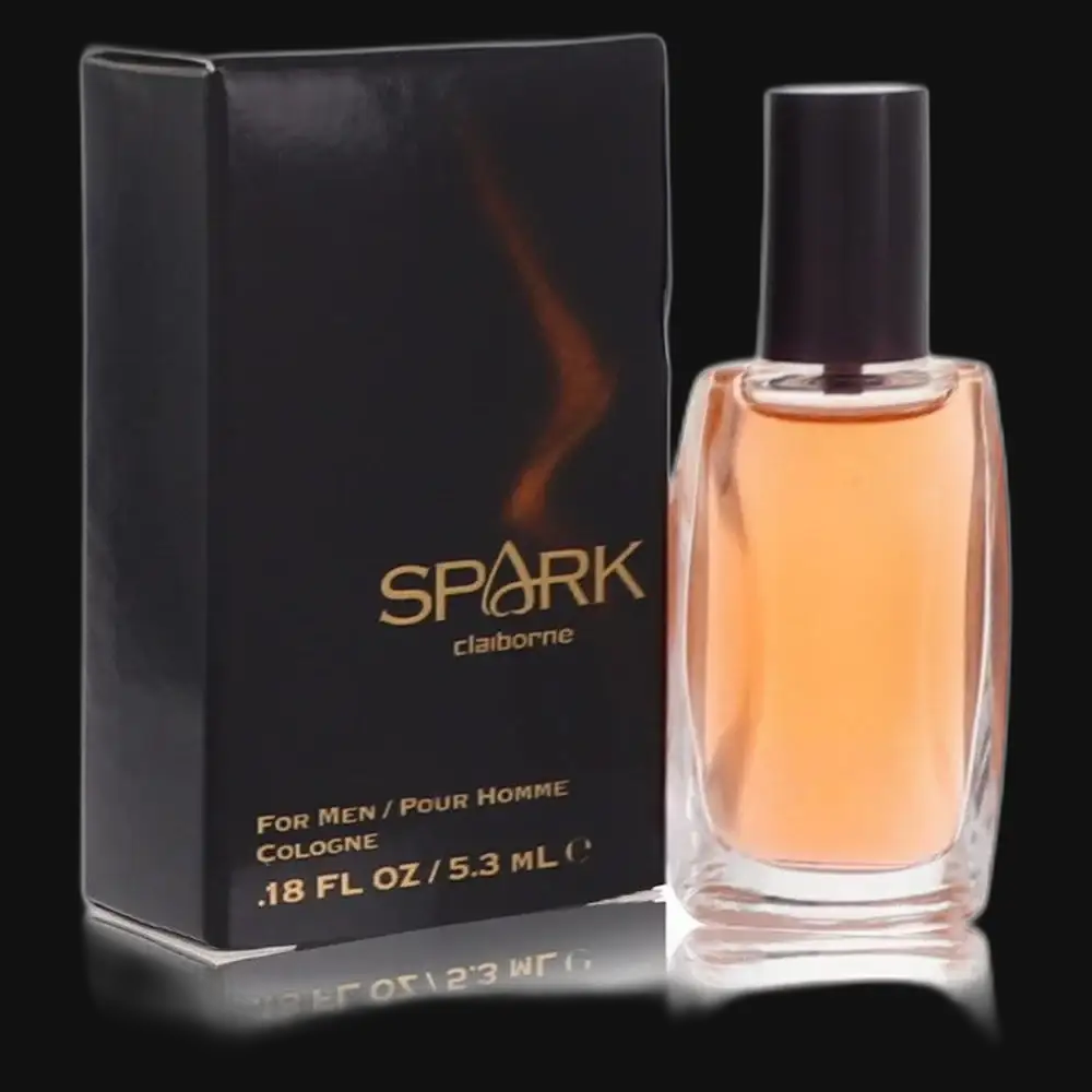 Liz Claiborne Spark men's cologne bottle with black box, amber liquid