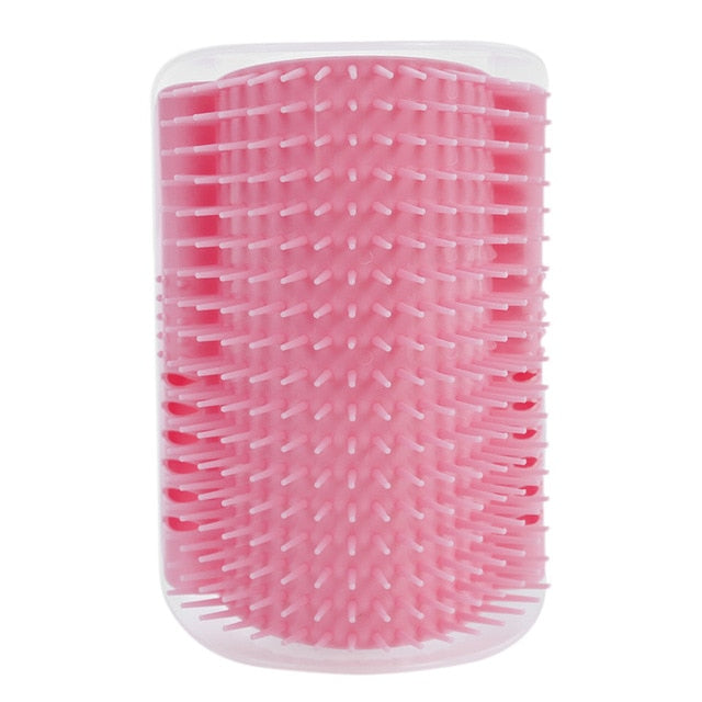 Cat self-groomer corner brush with pink bristles and white base