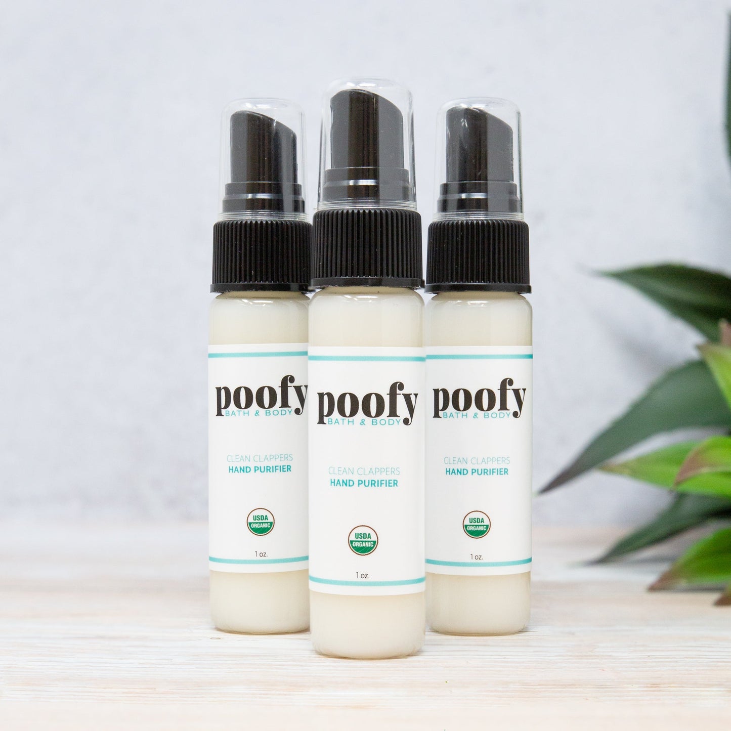 Organic hand purifier travel set, 3 bottles with black spray caps and pale liquid