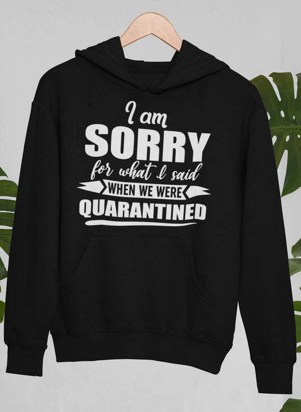 Black hoodie with hood and front kangaroo pocket, chest “I am Sorry…” graphic.