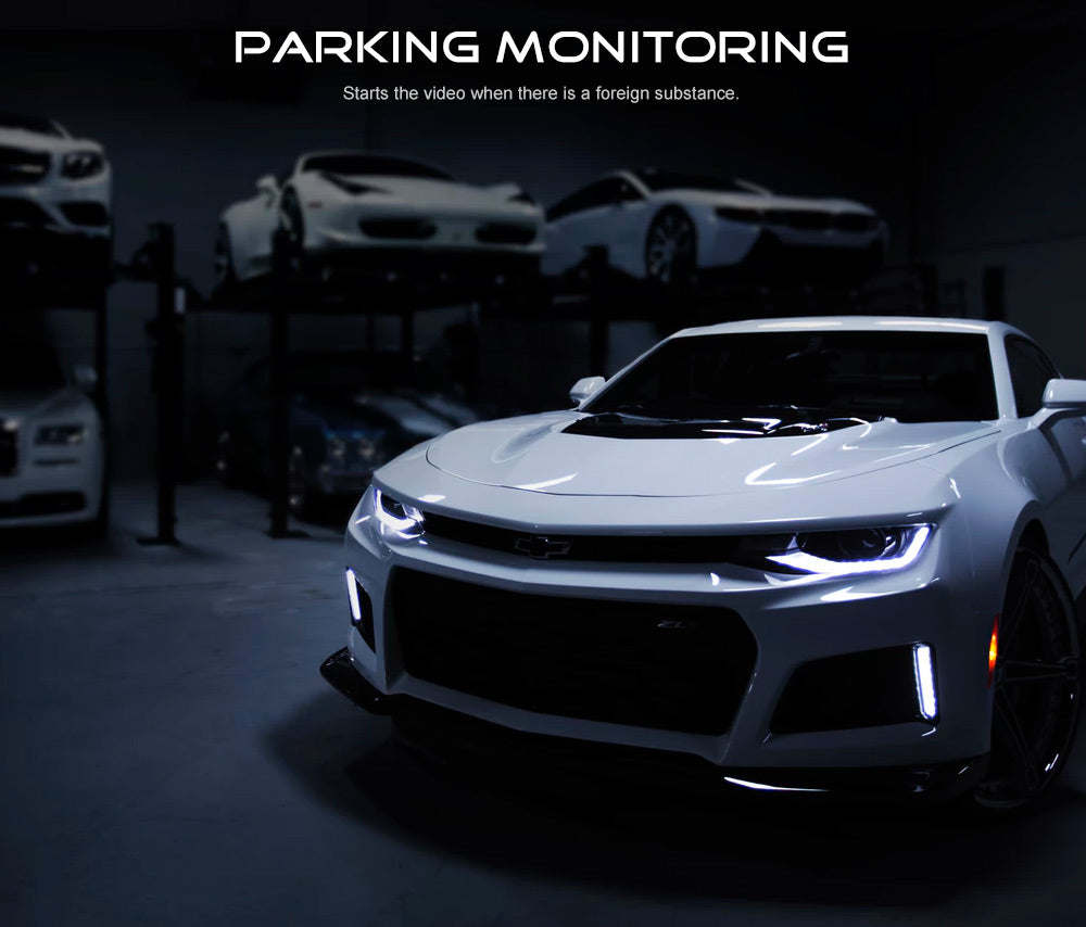 Car front with parking monitoring dashboard camera system, dark scene
