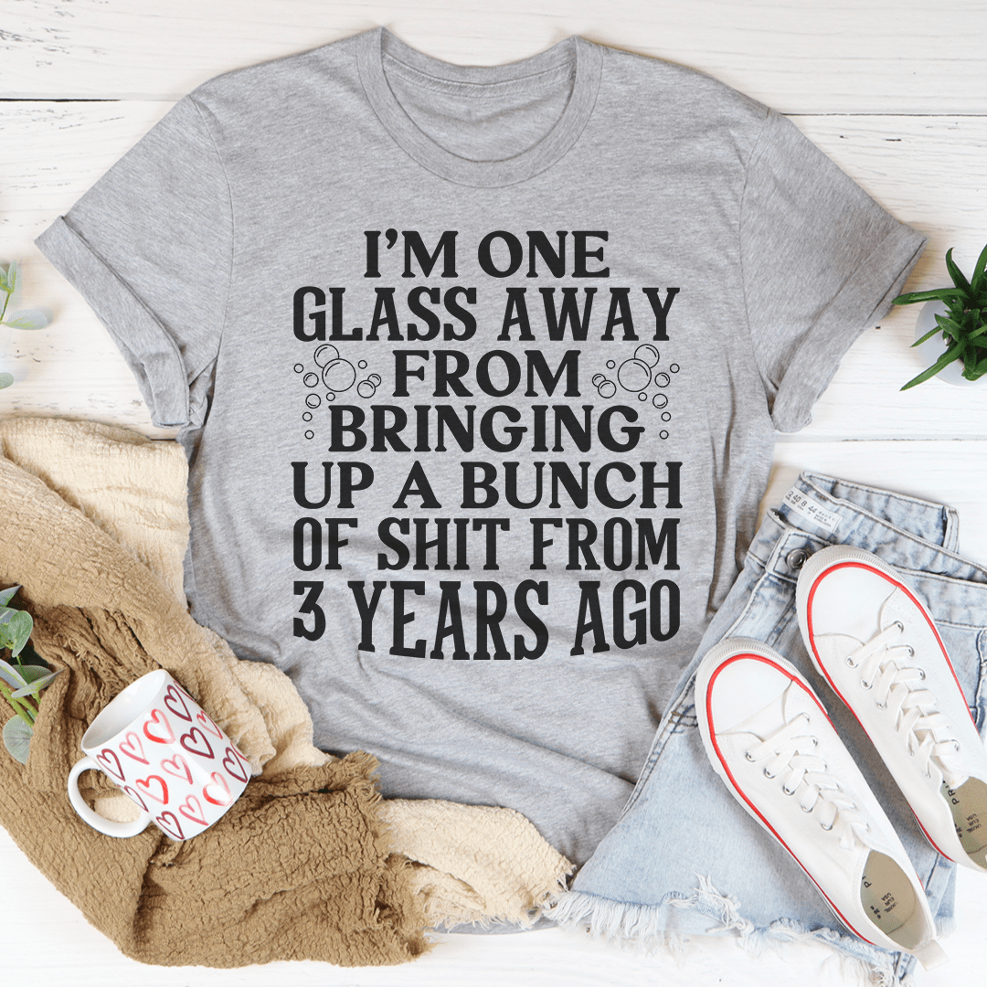 Heather gray crewneck graphic T-shirt with large bold central text slogan