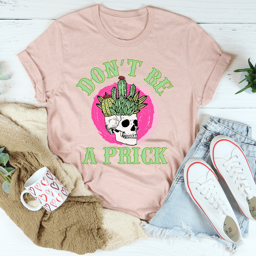 Pink graphic skull cactus T-shirt with green arched text